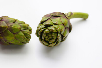 Fototapeta premium Purple artichoke on white background.