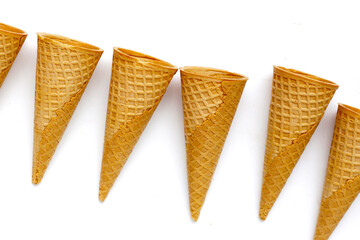 Waffle cones on white background