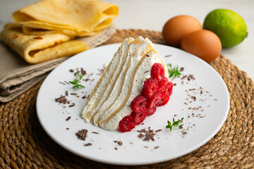 Mille Crepe Cake is a famous french recipe consisting on a cake made with layers crepes and cream.
