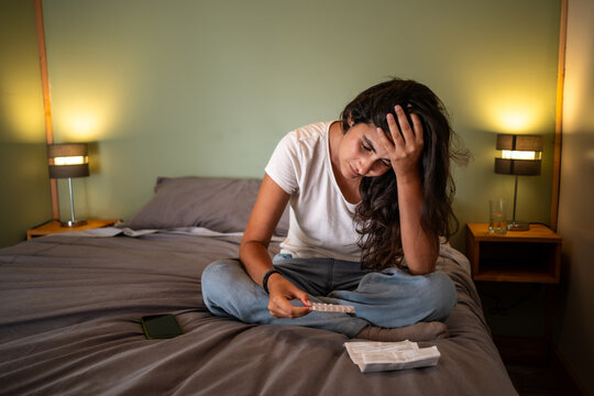 Woman with Headache from Birth Control Pills
