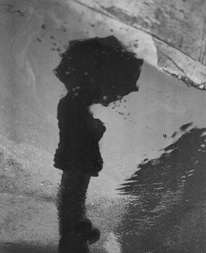 Woman with Umbrella Reflected