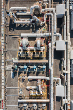 Aerial View of an Industrial Facility with Pipes, Tanks and Mach