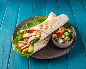 Tasty chicken wraps with grilled chicken and fresh veggies, ideal for a quick lunch or a nutritious dinner.