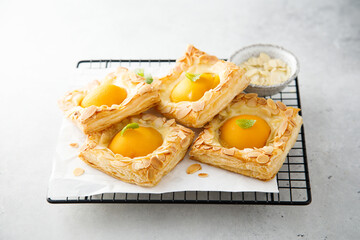 Apricot pastries with almond flakes