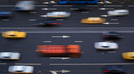 Busy city traffic during rush hour with blurred motion of vehicles