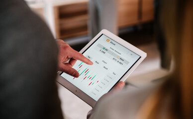 Digital analysis of cryptocurrency market trends on tablet