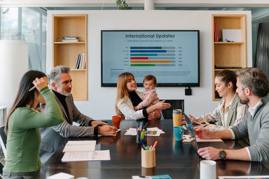 Business meeting room with team collaboration and presentation