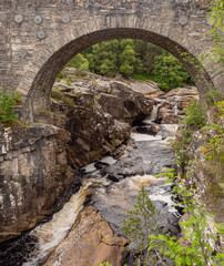 Impressive historic bridges over Blackwater river, at Little Garve, Inverness, Scotland, UK
