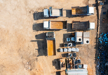 Aerial View of Dump Trucks at Construction Site