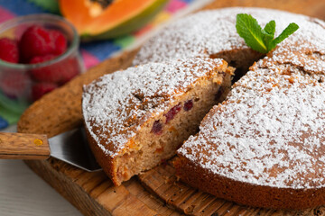 Delicious whole wheat vegan cake with papaya and nuts.