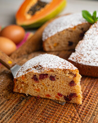 Delicious whole wheat vegan cake with papaya and nuts.