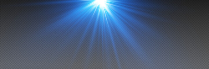 Obraz premium Blue light rays of light, light spark and flash.