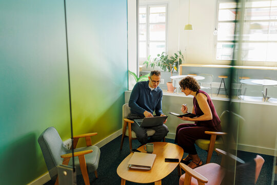 Business people working together in modern office room