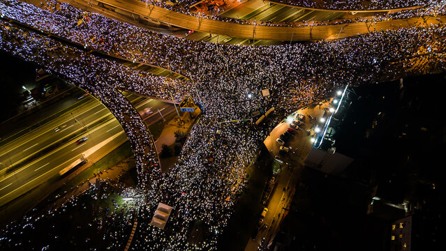 Protesters Light Up the Night in Memory of Tragedy