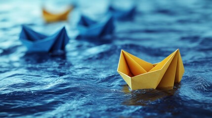 Fototapeta premium Yellow origami boat leads blue fleet on wavy water
