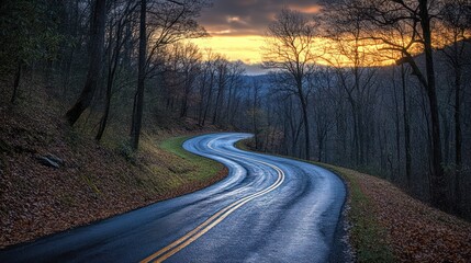 Obraz premium Winding mountain road sunset autumn travel