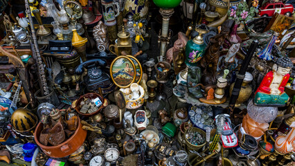 Obraz premium Colorful Collection of Vintage Antiques and Unique Items Displayed