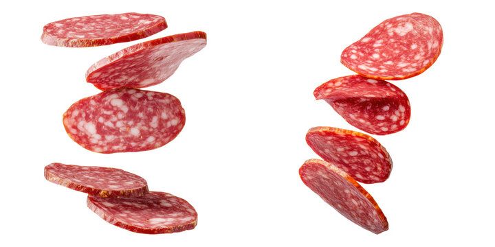 Slices of salami floating against transparency background, showcasing texture