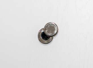 Close up shot of the door peephole. Concept