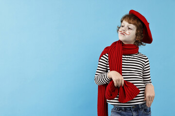 Cute boy in mime costume on light blue background, space for text. Surprise party
