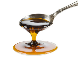 Honey Dripping from a Spoon onto a Plate 