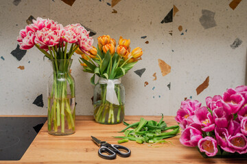 The process of caring for flowers. Trimming tulips