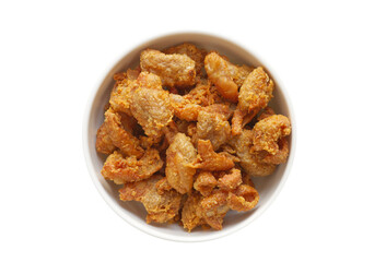 Thailand food snack, Deep-fried chicken skin in a white bowl on a white background, isolated image, top view image, crispy snack from animal.