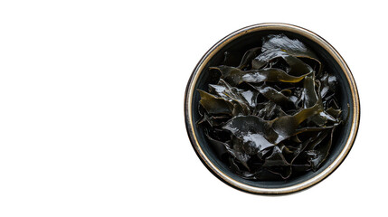 Dried kombu seaweed (Japanese dry kelp) in a bowl, top view --ar 16:9