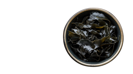 Dried kombu seaweed (Japanese dry kelp) in a bowl, top view --ar 16:9