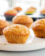  delicious carrot and pineapple muffins on a bright background close-up