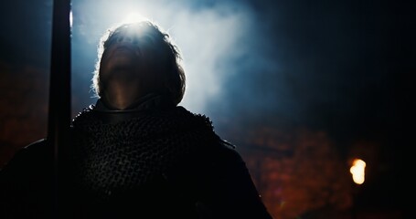A Hero Standing Resolutely in Enigmatic Shadowy Light, Ready for Any Challenges Ahead