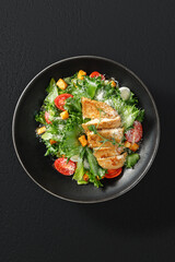 Caesar salad with grilled chicken, romaine lettuce, Parmesan cheese, croutons, and Caesar dressing. Elegant restaurant serving, studio lighting.