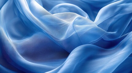 Obraz premium A cascade of azure chiffon, its silken texture shimmering under natural light, billows gently, revealing the intricate weave and fluid drape that make it a true masterpiece of elegance.