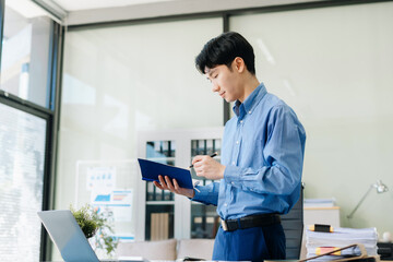Fototapeta premium Happy male enjoying work at home office.