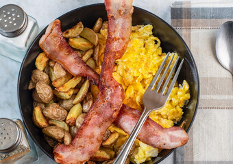  scramble egg served with  home fries and bacon