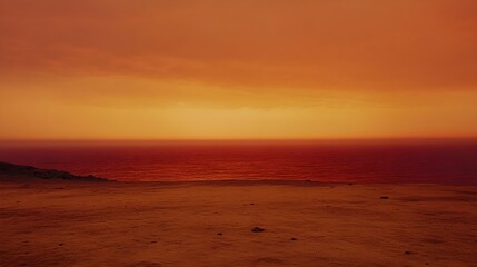 A photo of an endless savanna under a deep red sunset