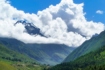 Naklejka premium mountain landscape with clouds
