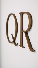 Luxury-style text featuring Q R jewels against a clean white backdrop with high-end typography