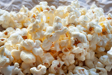 Popcorn. Heap of popcorn on the table Selective focus