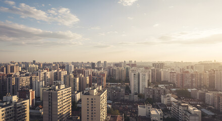 Modern City Skyline with High-Rise Buildings at Sunset