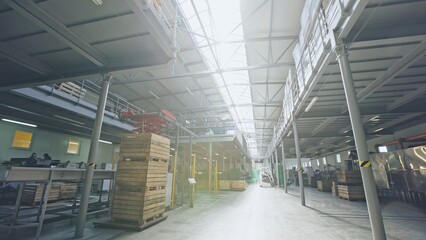 Bright and Spacious Interior of a Large Industrial Warehouse with Ample Room and Light