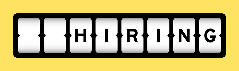 Black color in word hiring on slot banner with yellow color background