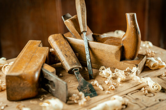 old carpenter tools on wood background