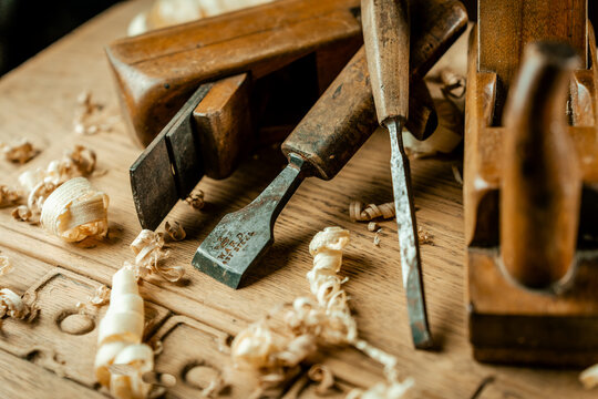 Old rusty tools on a wooden background