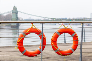 Orange Life Buoys on London Riverside


