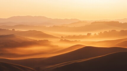 Obraz premium Serene Golden Sunrise Over Rolling Hills and Misty Landscape