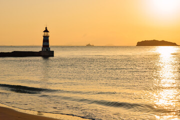 Beautiful lighthouse sunset Xunliao Bay coastline in Huizhou, Guangdong province, China, in January winter