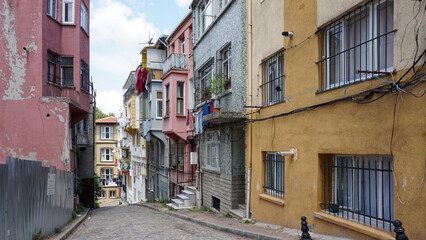 narrow street with colorful houses in an old town