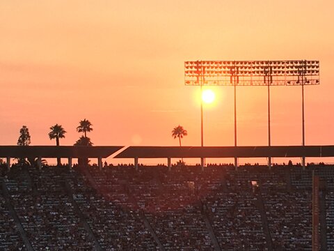 Beautiful golden sunset over a baseball stadium - Powered by Adobe