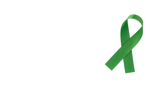 Green ribbon, symbol of social awareness, isolated background. World Cancer Day. copy space.